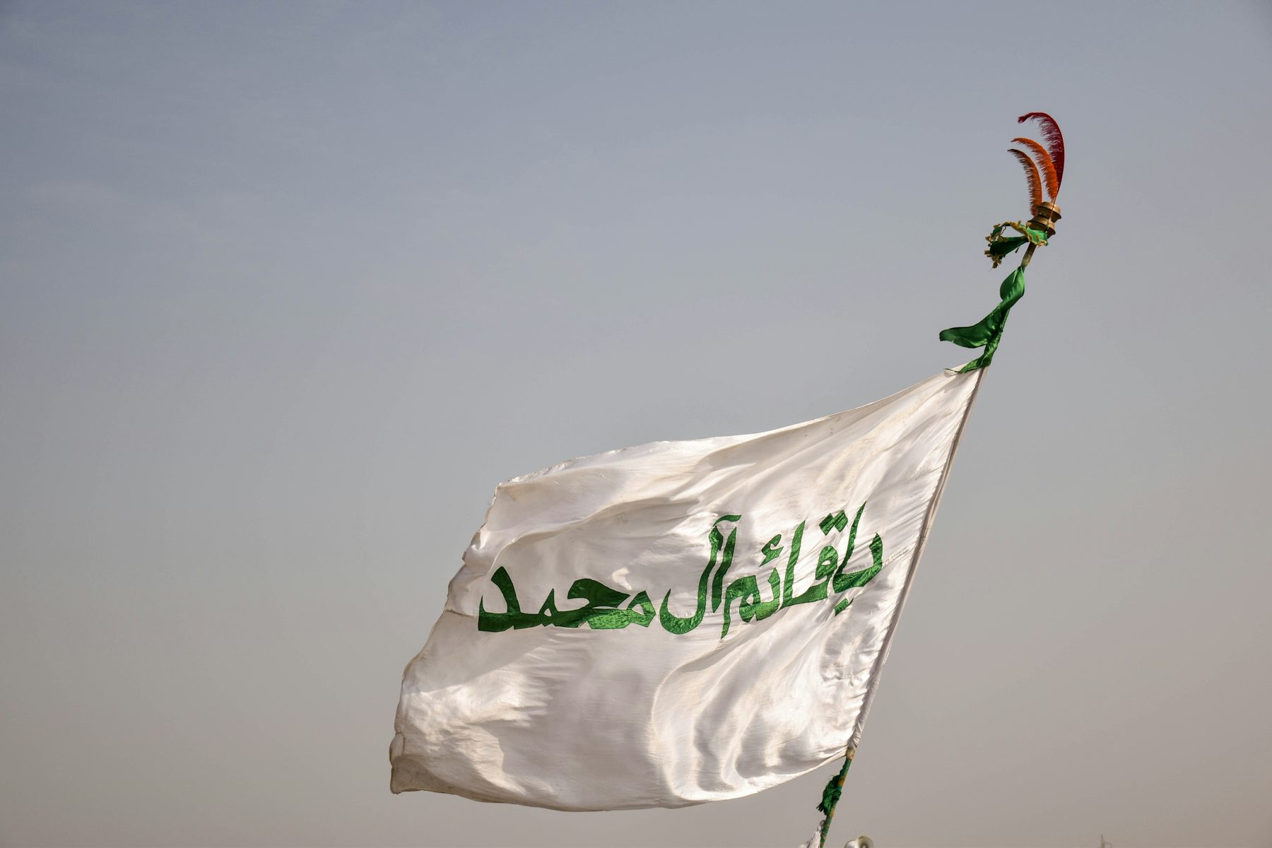 White devotional flag in the wind